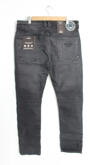 Jean Premium de alta calidad para hombre, corte moderno, color gris con bordado Monastery en pierna izquierda y nips