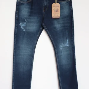 Jean Premium de alta calidad para hombre, corte moderno, color azul oscuro con bigotes, destroyer, pines y botón contramarcado